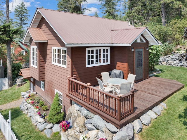 14980 Mt Highway 35, Bigfork, MT 59911 - wooden deck featuring outdoor dining space