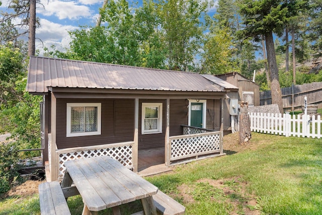 14980 Mt Highway 35, Bigfork, MT 59911 - view of front facade featuring a metal roof