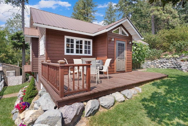 14980 Mt Highway 35, Bigfork, MT 59911 - wooden terrace with a yard