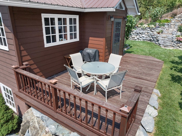 14980 Mt Highway 35, Bigfork, MT 59911 - deck with outdoor dining area and a grill
