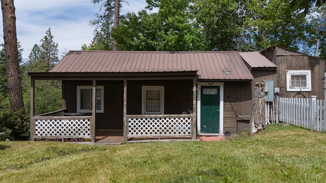 14980 Mt Highway 35, Bigfork, MT 59911 - view of front of property featuring a porch and a metal roof