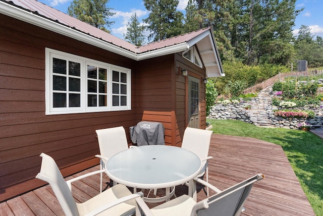 14980 Mt Highway 35, Bigfork, MT 59911 - wooden deck with outdoor dining space