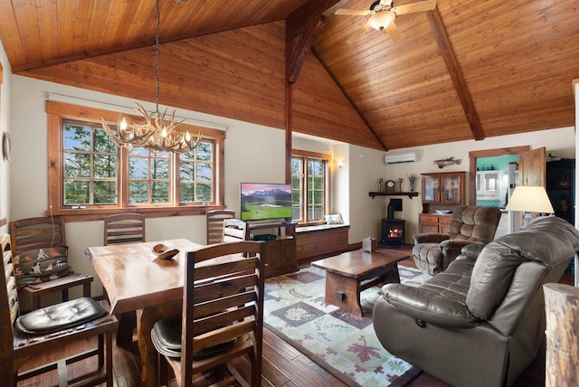 14980 Mt Highway 35, Bigfork, MT 59911 - living area with a wooden ceiling with exposed beams, a wall unit AC, a wood stove, hardwood / wood-style floors, and plenty of natural light