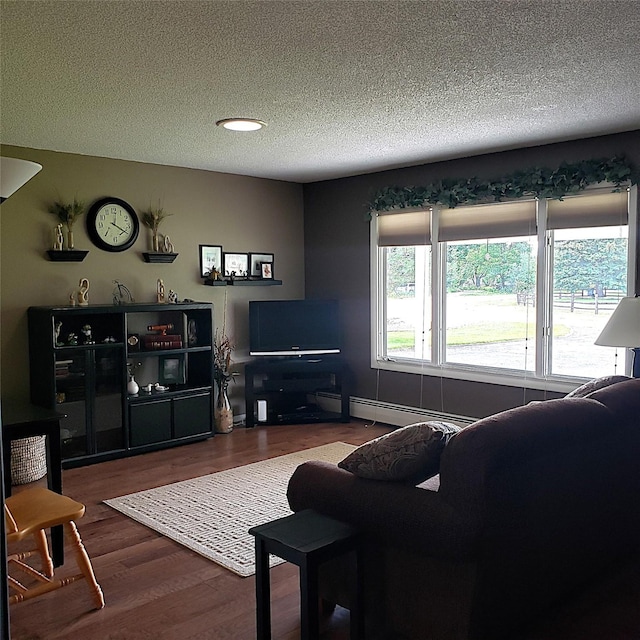 4400 Sierra Dr, Missoula, MT 59804 - living room featuring a textured ceiling and wood finished floors