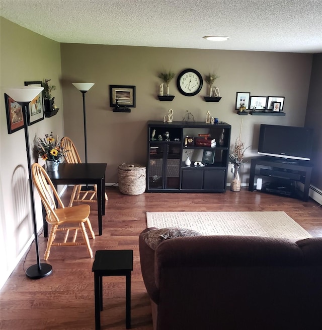 4400 Sierra Dr, Missoula, MT 59804 - living area featuring wood finished floors and a textured ceiling