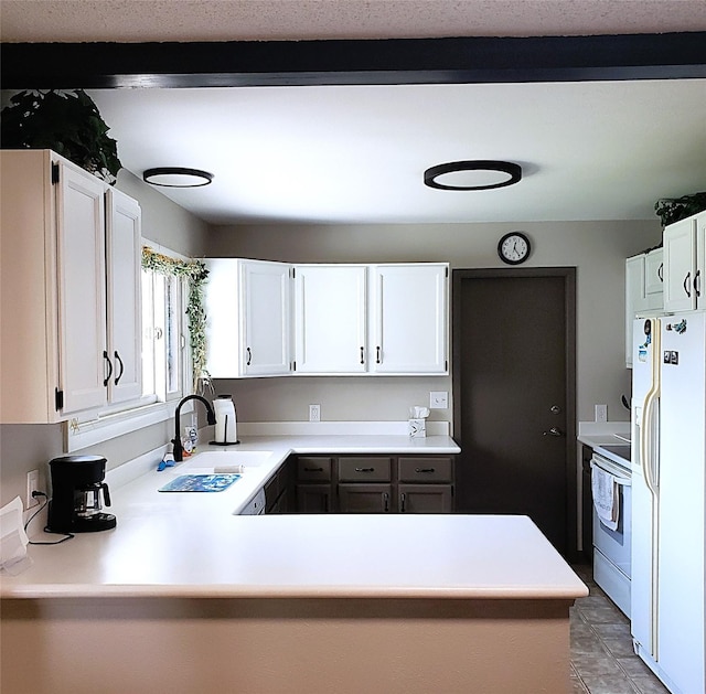 4400 Sierra Dr, Missoula, MT 59804 - kitchen featuring white refrigerator with ice dispenser, electric stove, white cabinetry, and light countertops