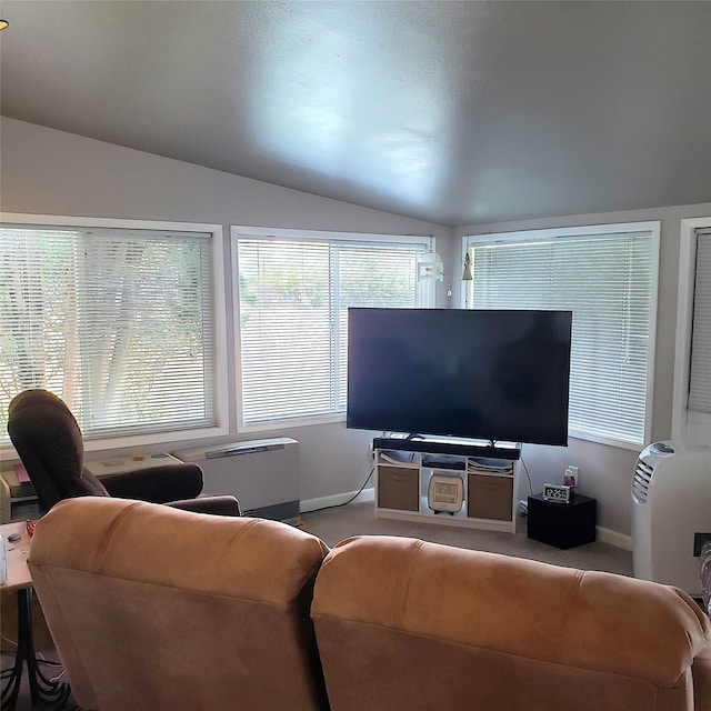 4400 Sierra Dr, Missoula, MT 59804 - living area featuring vaulted ceiling, healthy amount of natural light, and carpet