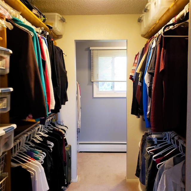 4400 Sierra Dr, Missoula, MT 59804 - walk in closet with a baseboard heating unit and carpet
