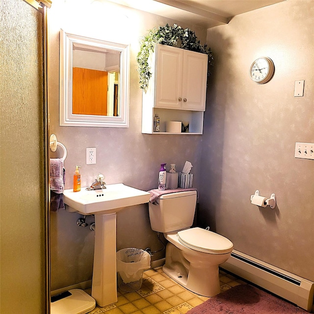4400 Sierra Dr, Missoula, MT 59804 - bathroom with a baseboard radiator and toilet