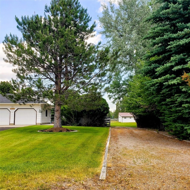4400 Sierra Dr, Missoula, MT 59804 - view of front of house featuring a front lawn and an attached garage