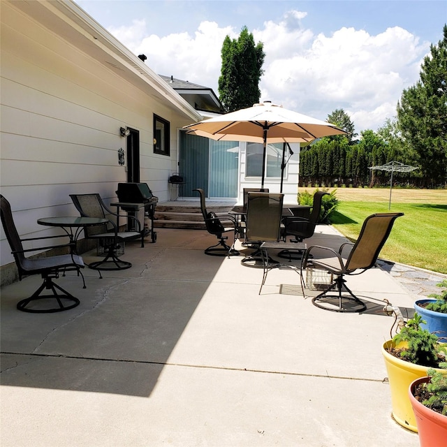 4400 Sierra Dr, Missoula, MT 59804 - view of patio with outdoor dining space and a grill