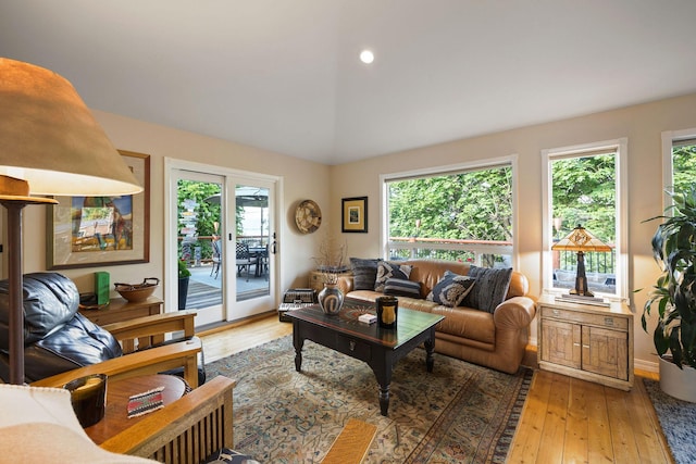 35AND33 Lakeside Ave, Lakeside, MT 59922 - living area with lofted ceiling, light wood-style flooring, and recessed lighting