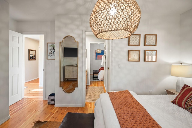 35AND33 Lakeside Ave, Lakeside, MT 59922 - bedroom featuring hardwood / wood-style flooring and baseboards