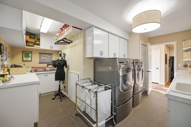 35AND33 Lakeside Ave, Lakeside, MT 59922 - laundry area with washing machine and clothes dryer, carpet, cabinet space, and a desk
