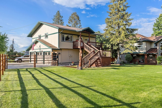 35AND33 Lakeside Ave, Lakeside, MT 59922 - rear view of house with stairs, a metal roof, and an attached garage