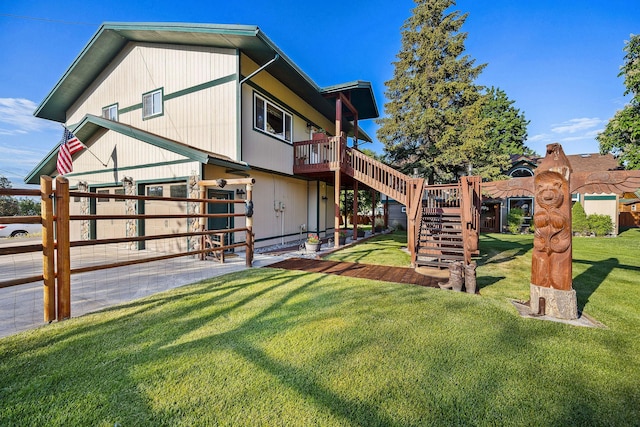 35AND33 Lakeside Ave, Lakeside, MT 59922 - rear view of house featuring a deck and stairway