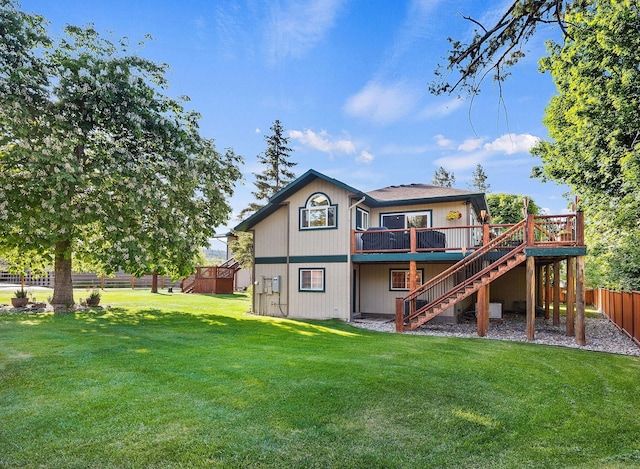 35AND33 Lakeside Ave, Lakeside, MT 59922 - back of house featuring stairs and a deck