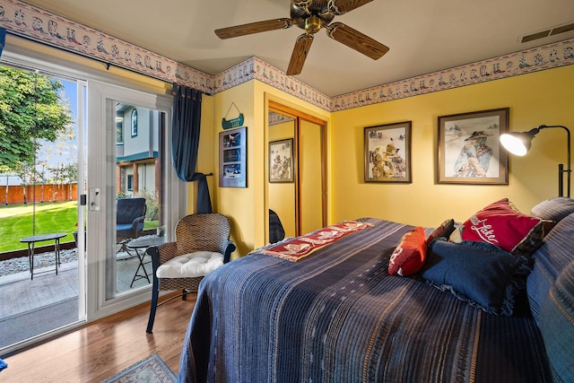 35AND33 Lakeside Ave, Lakeside, MT 59922 - bedroom featuring access to outside, wood finished floors, and ceiling fan