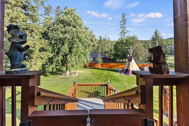 35AND33 Lakeside Ave, Lakeside, MT 59922 - wooden deck featuring a yard