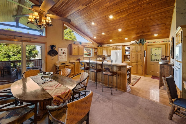 35AND33 Lakeside Ave, Lakeside, MT 59922 - dining room featuring wooden ceiling, recessed lighting, light colored carpet, and high vaulted ceiling