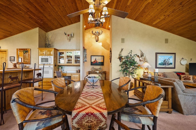 35AND33 Lakeside Ave, Lakeside, MT 59922 - dining space featuring vaulted ceiling, ceiling fan, wooden ceiling, and light colored carpet