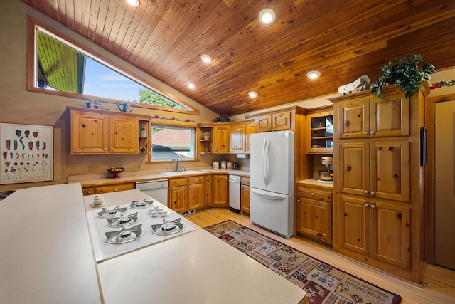 35AND33 Lakeside Ave, Lakeside, MT 59922 - kitchen with white appliances, open shelves, wooden ceiling, light countertops, and light wood finished floors