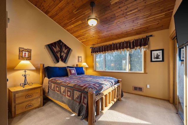 35AND33 Lakeside Ave, Lakeside, MT 59922 - carpeted bedroom featuring wood ceiling and vaulted ceiling
