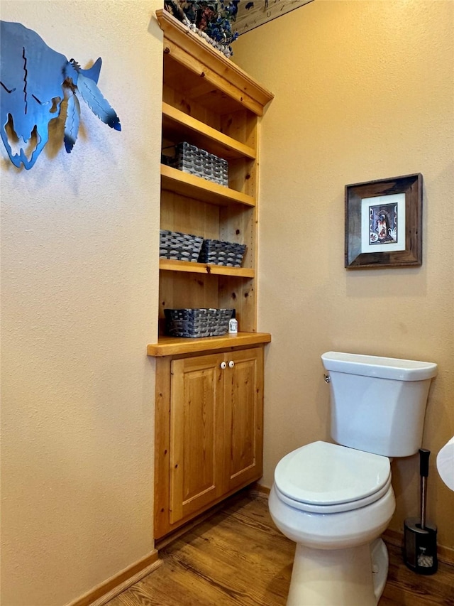 35AND33 Lakeside Ave, Lakeside, MT 59922 - half bath featuring wood finished floors and toilet