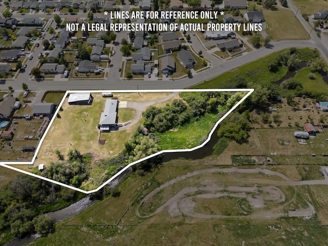 91 Denver Ave, Kalispell, MT 59901 - view of property location with property parcel outlined and nearby suburban area