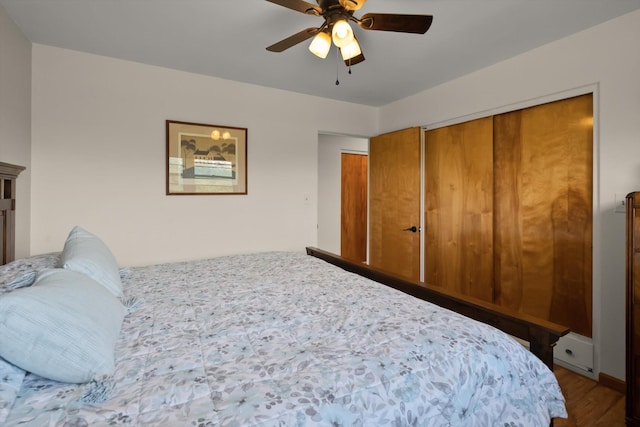 91 Denver Ave, Kalispell, MT 59901 - bedroom featuring dark wood-style flooring, ceiling fan, and a closet