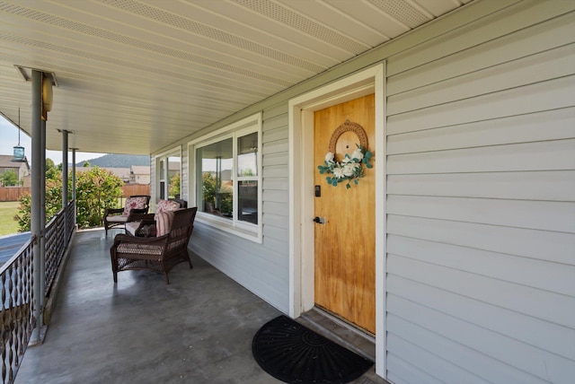 91 Denver Ave, Kalispell, MT 59901 - doorway to property featuring a porch