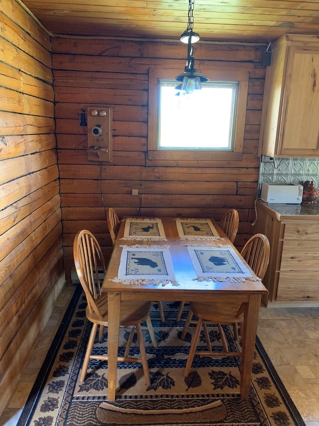 8325 Thunder Rd, Lincoln, MT 59639 - dining room featuring wooden ceiling and log walls