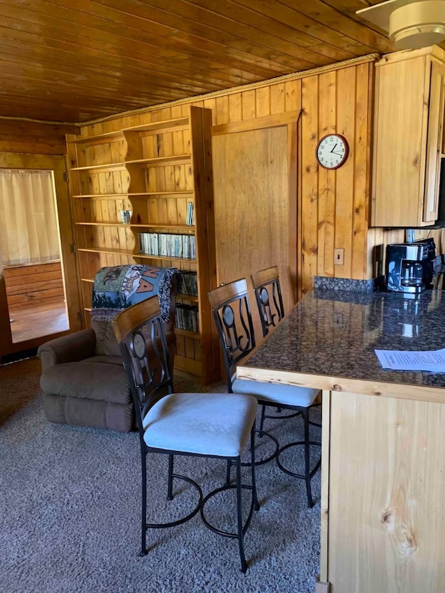 8325 Thunder Rd, Lincoln, MT 59639 - carpeted dining space featuring wood ceiling and wood walls