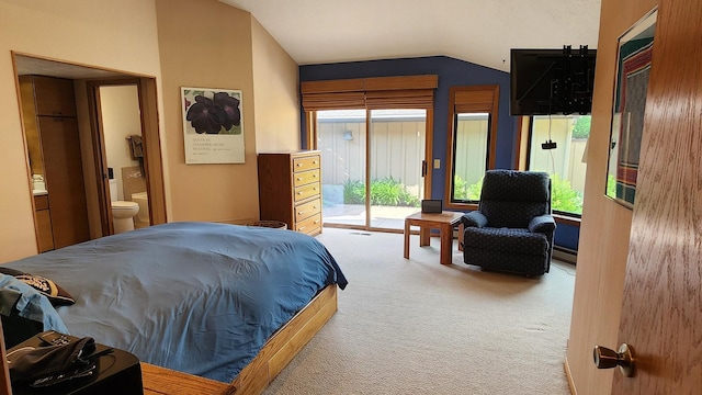 122 Fairway Blvd, Kalispell, MT 59901 - carpeted bedroom featuring vaulted ceiling, access to exterior, and ensuite bathroom