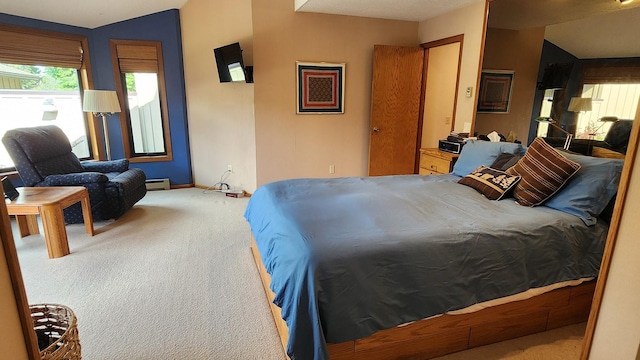 122 Fairway Blvd, Kalispell, MT 59901 - bedroom with carpet floors and baseboard heating