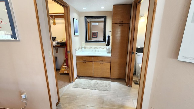 122 Fairway Blvd, Kalispell, MT 59901 - corridor with a sink and recessed lighting