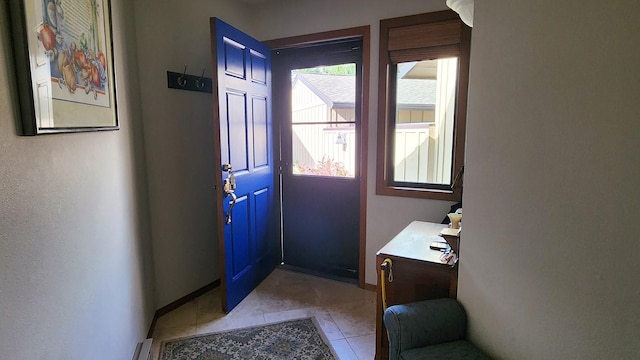 122 Fairway Blvd, Kalispell, MT 59901 - doorway with baseboards and light tile patterned floors