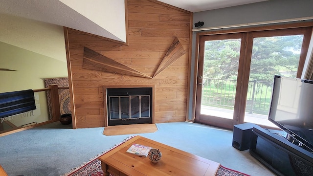 122 Fairway Blvd, Kalispell, MT 59901 - living room featuring carpet flooring, plenty of natural light, and a fireplace with flush hearth