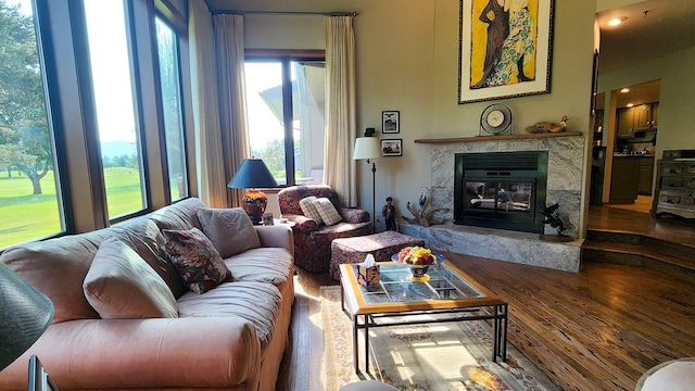122 Fairway Blvd, Kalispell, MT 59901 - living area featuring wood finished floors and a high end fireplace