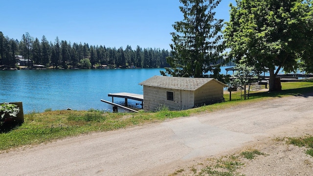 21439 Rollins Lakeshore Dr, Rollins, MT 59931 - dock with a water view and a view of trees