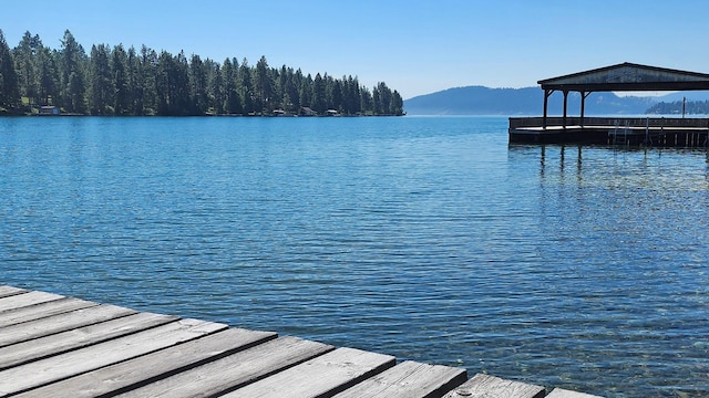 21439 Rollins Lakeshore Dr, Rollins, MT 59931 - dock with a water and mountain view
