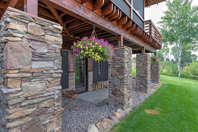 349 Harlan Creek Rd, Hamilton, MT 59840 - property entrance featuring stone siding and a lawn