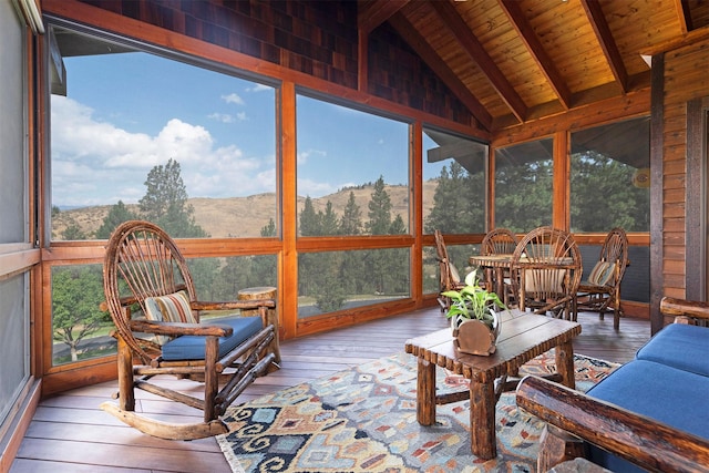 349 Harlan Creek Rd, Hamilton, MT 59840 - sunroom with wood ceiling, a mountain view, hardwood / wood-style flooring, and healthy amount of natural light