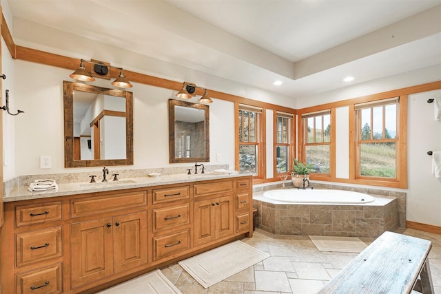 349 Harlan Creek Rd, Hamilton, MT 59840 - full bath with double vanity, a garden tub, recessed lighting, and stone finish floors