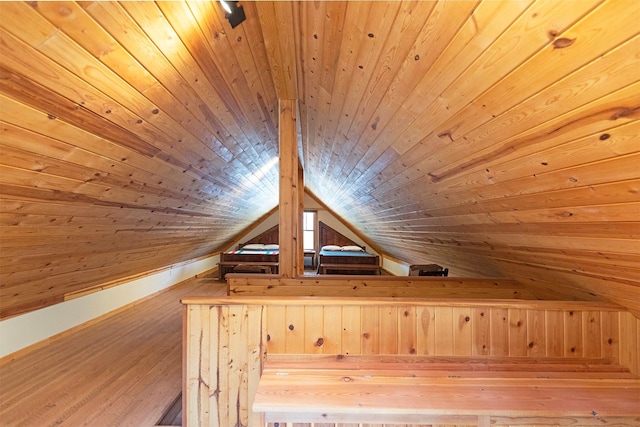 349 Harlan Creek Rd, Hamilton, MT 59840 - additional living space with wooden ceiling, wooden walls, vaulted ceiling, and wood finished floors