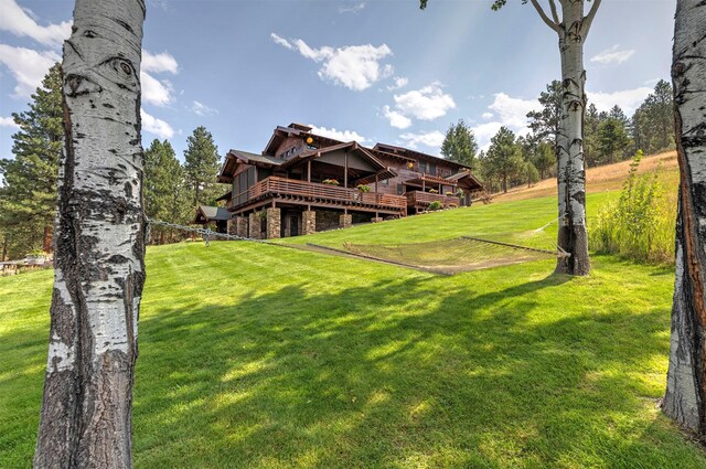 349 Harlan Creek Rd, Hamilton, MT 59840 - view of grassy yard featuring a deck
