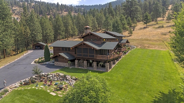 349 Harlan Creek Rd, Hamilton, MT 59840 - view of subject property with a heavily wooded area