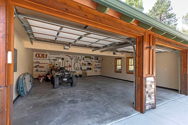349 Harlan Creek Rd, Hamilton, MT 59840 - garage featuring a garage door opener and electric panel