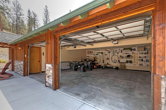 349 Harlan Creek Rd, Hamilton, MT 59840 - garage featuring a garage door opener