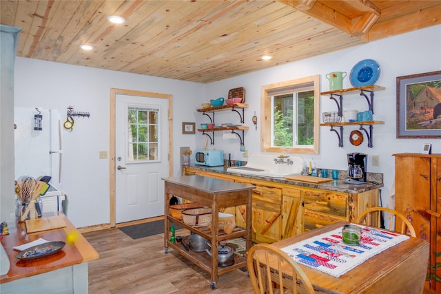716 Kootenai River Rd, Troy, MT 59935 - kitchen featuring open shelves, wooden ceiling, white microwave, light wood finished floors, and recessed lighting